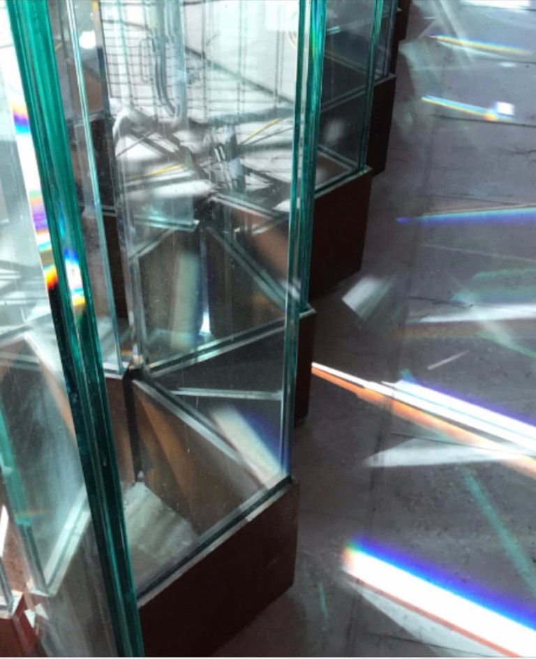 Hackney Wick Station - Detail View Of Molecular Glass Wall Installation with sunlight refracting through the glass by Collaborating Artist Wendy Hardie 2018