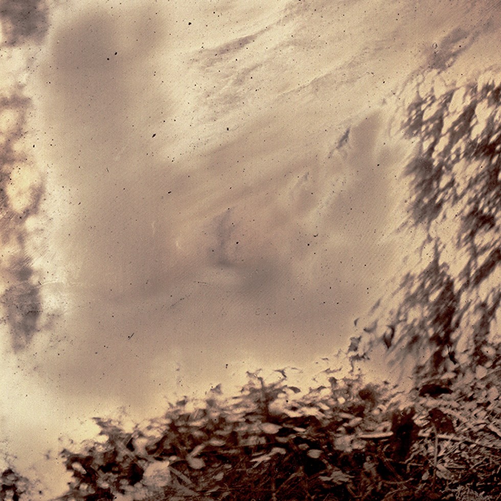'awakening' by fine art photographic artist Wendy Hardie is a wet plate collodion work that explores our fragile planet through the contextual history of plastic. The world's first plastic was produced close to this captured image on the River Lea in East London.